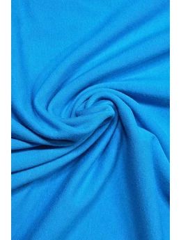 Türkiz egyszínű 95% pamut 5% elasztán, 180cm széles elasztikus pamut jersey.