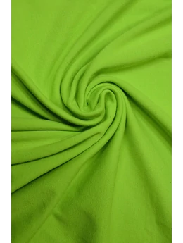 Kiwi-zöld egyszinű 95% pamut 5% elasztán, 180cm széles elasztikus jersey.