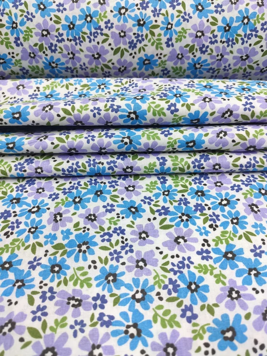 mintás pamutvászon /türkiz-lila színű mezei virágok (legnagyobb virág 2cm×1,8cm) /fehér